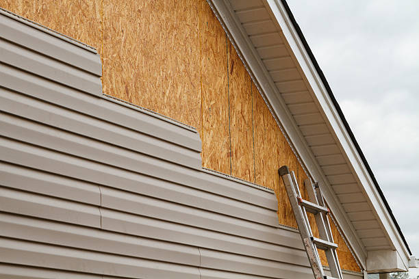 Professional Vinyl Siding technician working in Henderson, GA